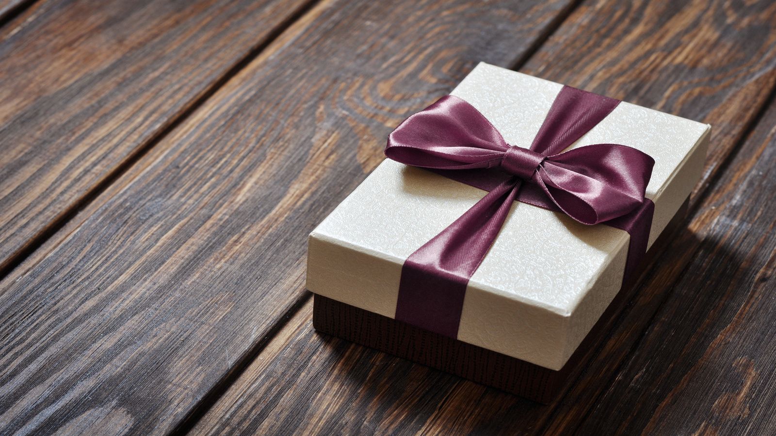 Brown Gift Box on Wooden Background 1